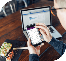 A man looks at his online banking from his phone